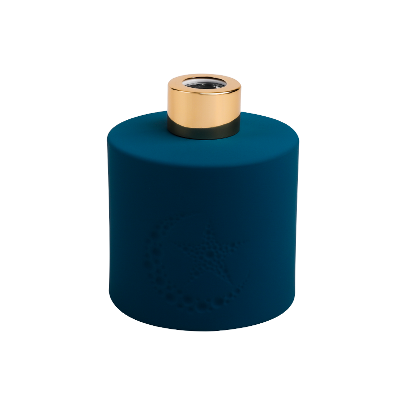 Bouteille de parfum bleu étoile avec bonnet doré